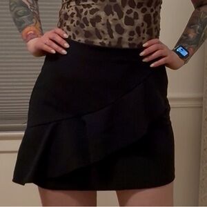 Zara black skirt with front ruffle and gold zipper